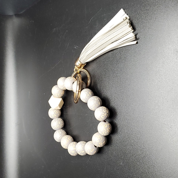 Gray Stretch Wooden Leopard Beaded Key Chain with Gray Tassel - Picture 1 of 1